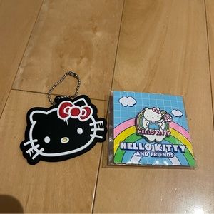 - New hello kitty keychain/pin bundle